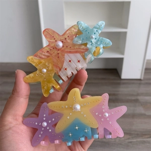 Starfish hair claw clip with colorful rhinestones and imitation pearl accents