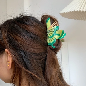 Elegant butterfly hair claw in yellow-green gradient acetate for half-tied long hairstyles