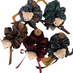 Plaid scrunchie set with plush bear and vintage button for women hair styling