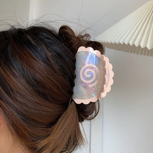 Pink wavy acetic acid shark hair claw clip with iridescent spiral design for women