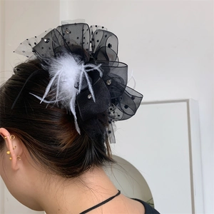 Plush bow hair claw clip with black lace polka dots, white feathers and rhinestones