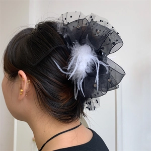 Lace polka dot bow hair claw with white feathers and rhinestones for elegant styling