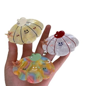 Cute acetate pumpkin shell hair claw clips with marble texture and star accents