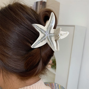 Pince à cheveux élégante en forme d'étoile de mer en acétate avec pois blancs