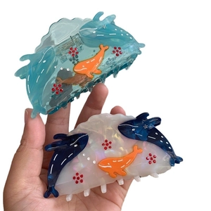 Elegant ocean-themed acetate shark hair claws with whale decor and sparkling rhinestones