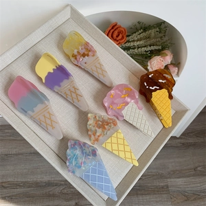 Detailed set of ice cream shaped acetate hair claws in various colors and marble textures