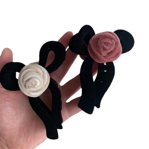 Elegant velvet rose hair claw clips in cream white and pink floral design for women