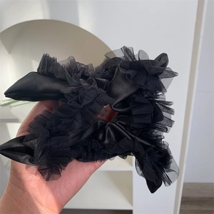 Elegant black satin and tulle layered scrunchie with a romantic ballet-inspired design