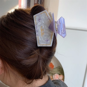 Large marble pattern acetate shark hair claw clip with purple rhinestones for women