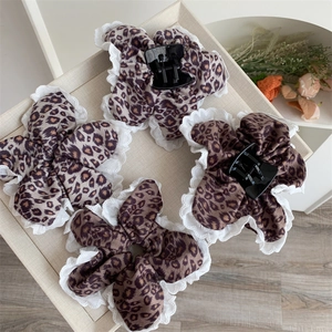 Leopard print hair claw clips and scrunchie set with white lace trim for women