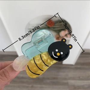Detail shot showing the 8.3cm cute acetate giraffe hair claw clip with dimensions