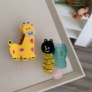 Cute acetate giraffe and butterfly hair claws for women in creative colorful designs