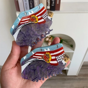 Set di due grandi mollette per capelli in acetato con figura e motivo marmoreo viola