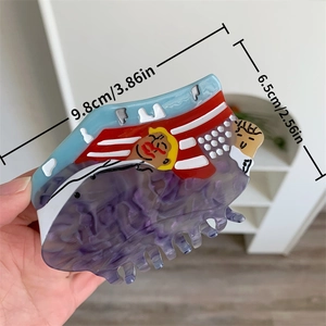 Grande molletta per capelli in acetato con motivo marmorizzato viola e arte ritratto