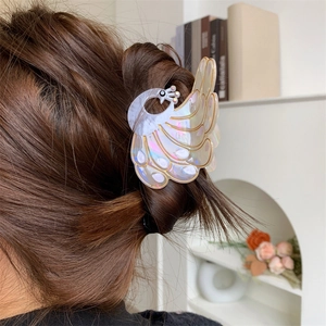 Elegant peacock-shaped large hair claw clip with colorful iridescent pearl finish