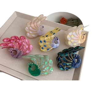 Set of six peacock hair claw clips in colorful pearlescent resin for creative styling