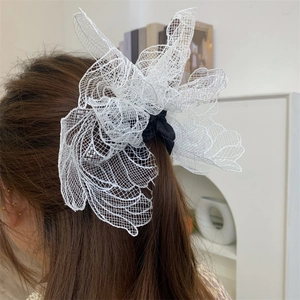 Elegant large white lace flower hair tie scrunchie for women with sheer mesh details