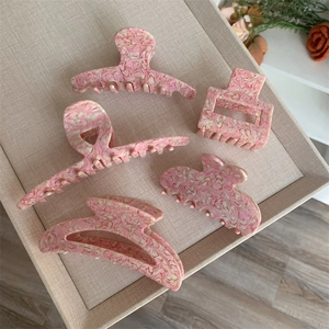 Pink marble texture acetate hair claw clips set for women in elegant pastel colors