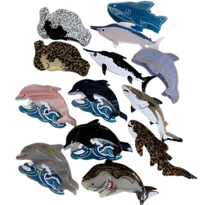 Pinces à cheveux en acétate sur le thème marin incluant requins, dauphins et baleines
