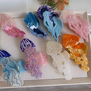 Pinze per capelli a forma di medusa in acetato con venature marmoree colorate