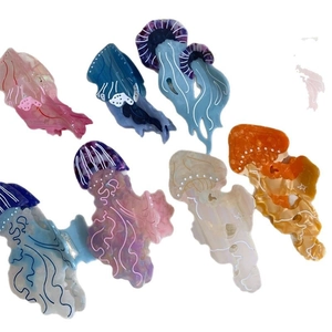 Pinze per capelli a forma di medusa in acetato in sei vari colori effetto marmo