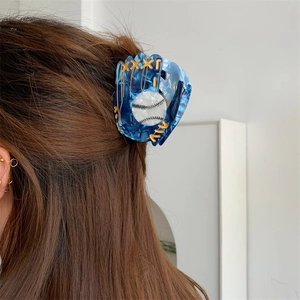Unique baseball glove claw clip made of blue acetate marble texture for athletic hair styling