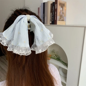 Elegant light blue lace hair claw clip with bow and pearls for romantic styling