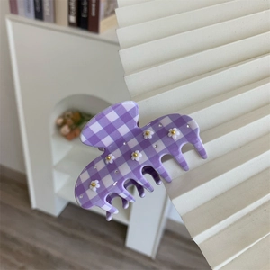 Molla per capelli a quadretti viola con accenti floreali bianchi e dettagli dorati