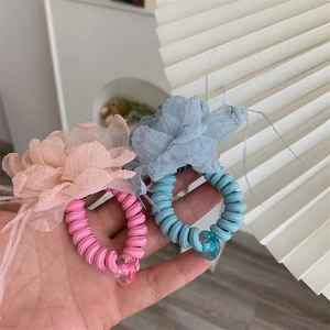 Pink and blue spiral hair ties with sheer organza flowers and heart beads