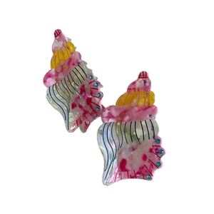 Colorful acetate shell hair claw clips with floral patterns and sparkling blue rhinestones