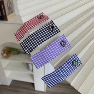 Set of four plaid hair clips featuring delicate silver and colored bead flower accents