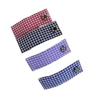 Set of four floral plaid hair clips in red, black, purple and blue for women