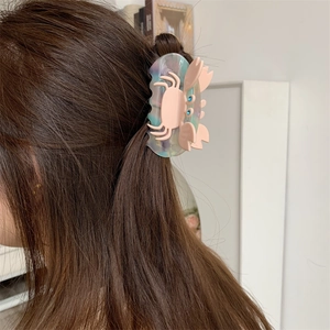 Pink crab hair claw clip with blue gems on brown hair, medium size acetate hair clip