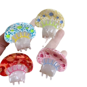 Colorful mushroom acetate hair claws in blue, yellow, red and pink for women's hairstyles