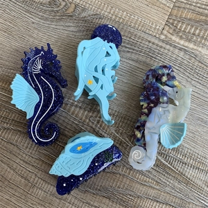 Pinces à cheveux série océan avec motifs hippocampe, méduse et coquillage en acétate