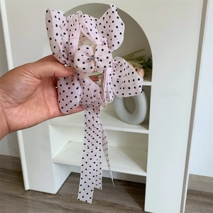 Pink polka dot ribbon hair claw clip with long tassels and elegant rhinestones