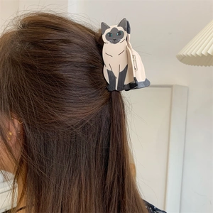 Detailed view of creative Siamese cat acetate hair claw clip for elegant half-up hairstyles