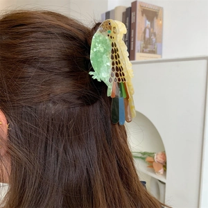 Parrot-shaped acetate hair claw clip with colorful marble texture for women's hairstyle
