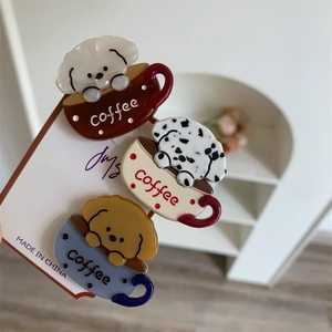 Set of three cute cartoon dog and coffee acetate hair clips in brown, beige, and blue