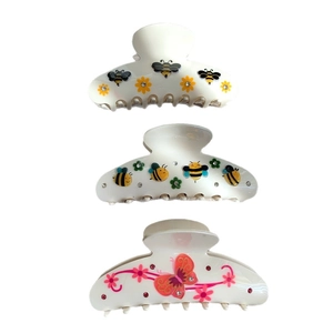 Set di tre pinze per capelli bianche con motivi di api e farfalle e piccoli strass