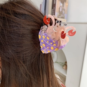 Pince à cheveux créative en forme de bernard-l'ermite à pois et fini brillant