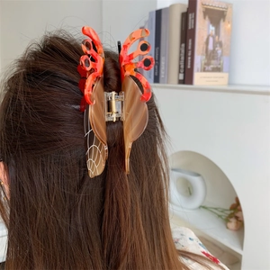Große Haarklammer aus Acetat im Einsiedlerkrebs-Design mit orangem Schildpatt-Muster