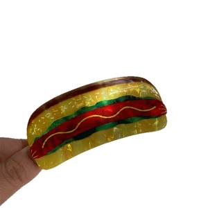 Creative hot dog hair claw clip with pearlescent finish and colorful food design
