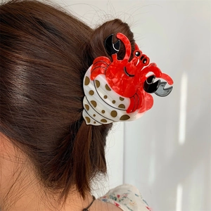 Pince à cheveux crabe ermite créative avec crabe rouge et base en coquille à pois blancs