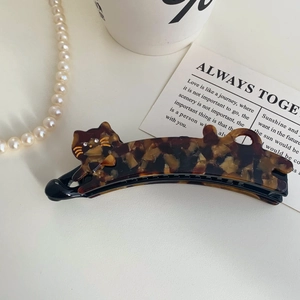Chic tortoiseshell acetate cat banana hair clip with elegant sparkling rhinestone eyes