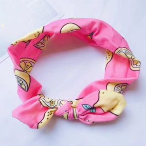 Bandeau bébé en coton rose avec imprimé citron jaune et nœud papillon noué souple