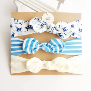 Three-pack cotton baby headbands with blue bulldog, stripes, and polka dot bow knots