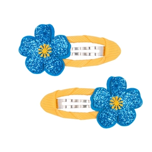 Dettaglio di fermagli per capelli in tessuto giallo con fiori glitterati blu