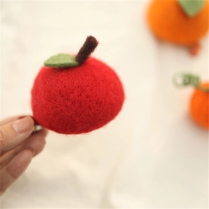 Cute handmade wool felt apple hair clip for girls with green leaf and orange fruit accent