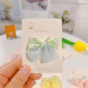 Floral butterfly hair clip for girls with green patterns and blue mesh lace tassel design